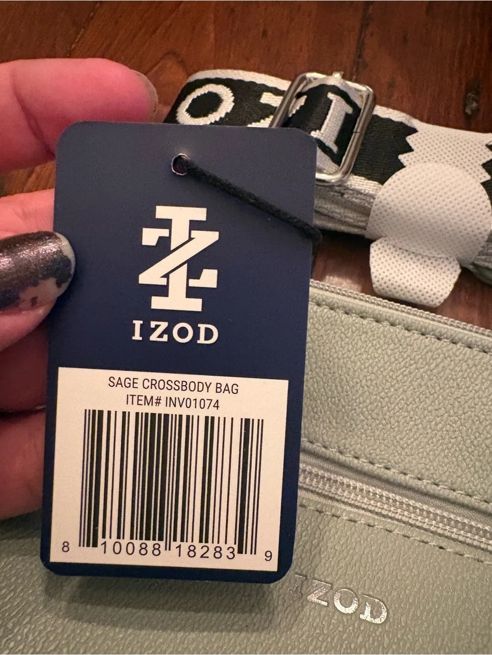 Izod Light Gray Pebbled Crossbody Bag with Branded Strap